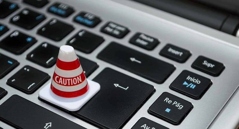 white caution cone on keyboard